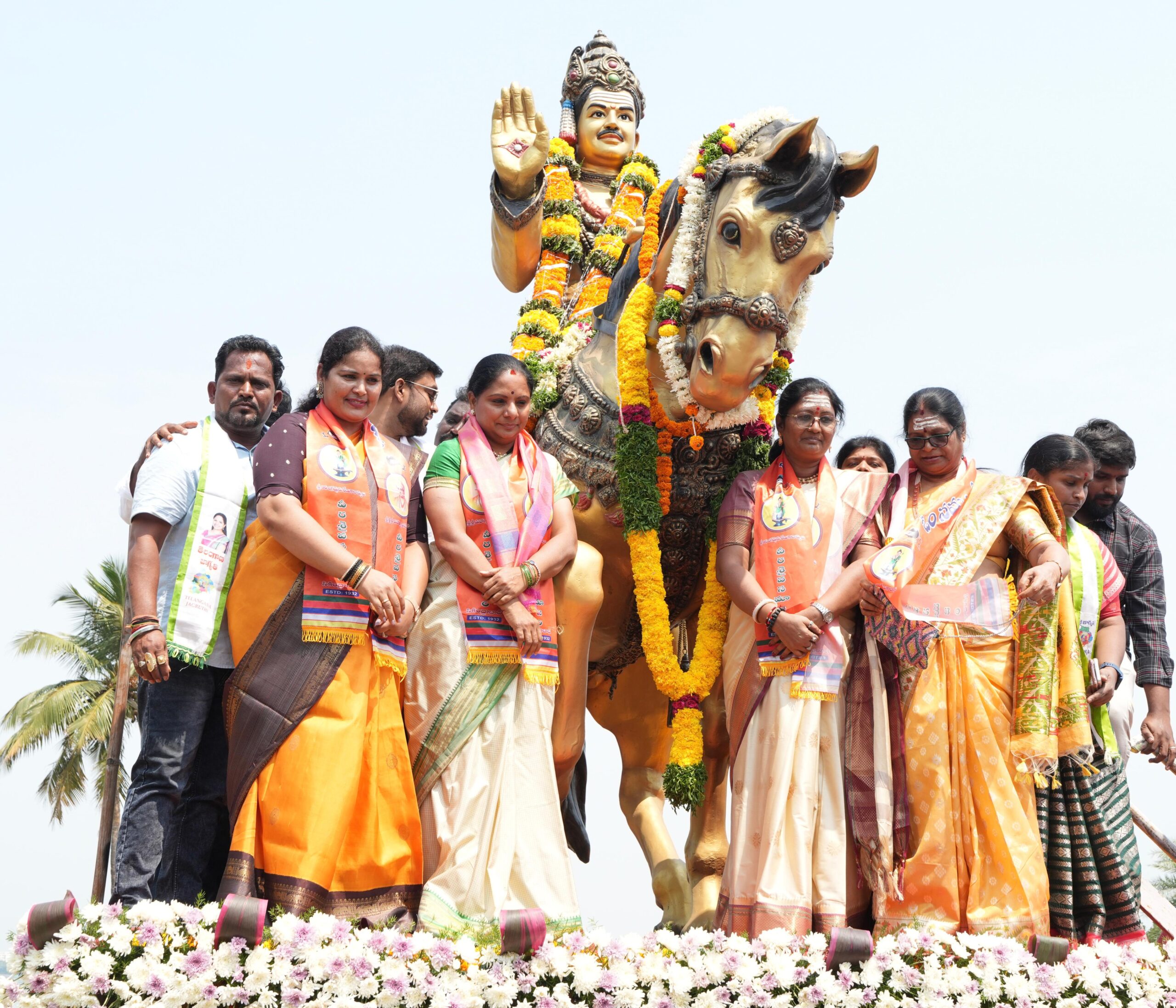 Kalvakuntla Kavitha paying floral tribute to Basaveshwara statue at Tank Bund Hyderabad on Basaveshwara Jayanti 2026