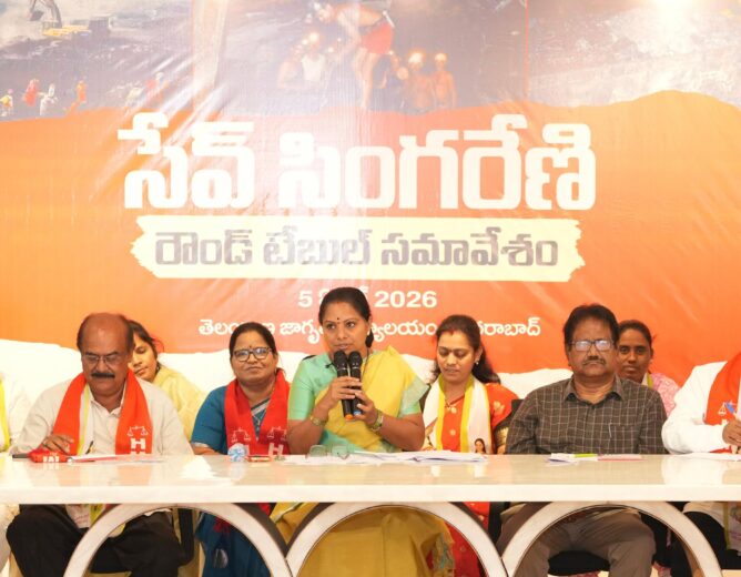 A strong visual of Kalvakuntla Kavitha addressing media at a round table meeting, highlighting allegations of corruption in Singareni Collieries Company Limited and questioning Telangana government's solar and lithium refinery deals