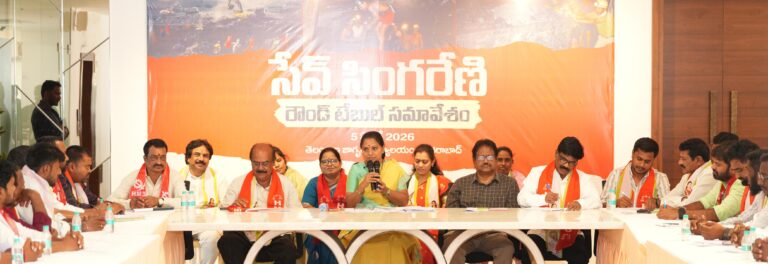 A strong visual of Kalvakuntla Kavitha addressing media at a round table meeting, highlighting allegations of corruption in Singareni Collieries Company Limited and questioning Telangana government's solar and lithium refinery deals