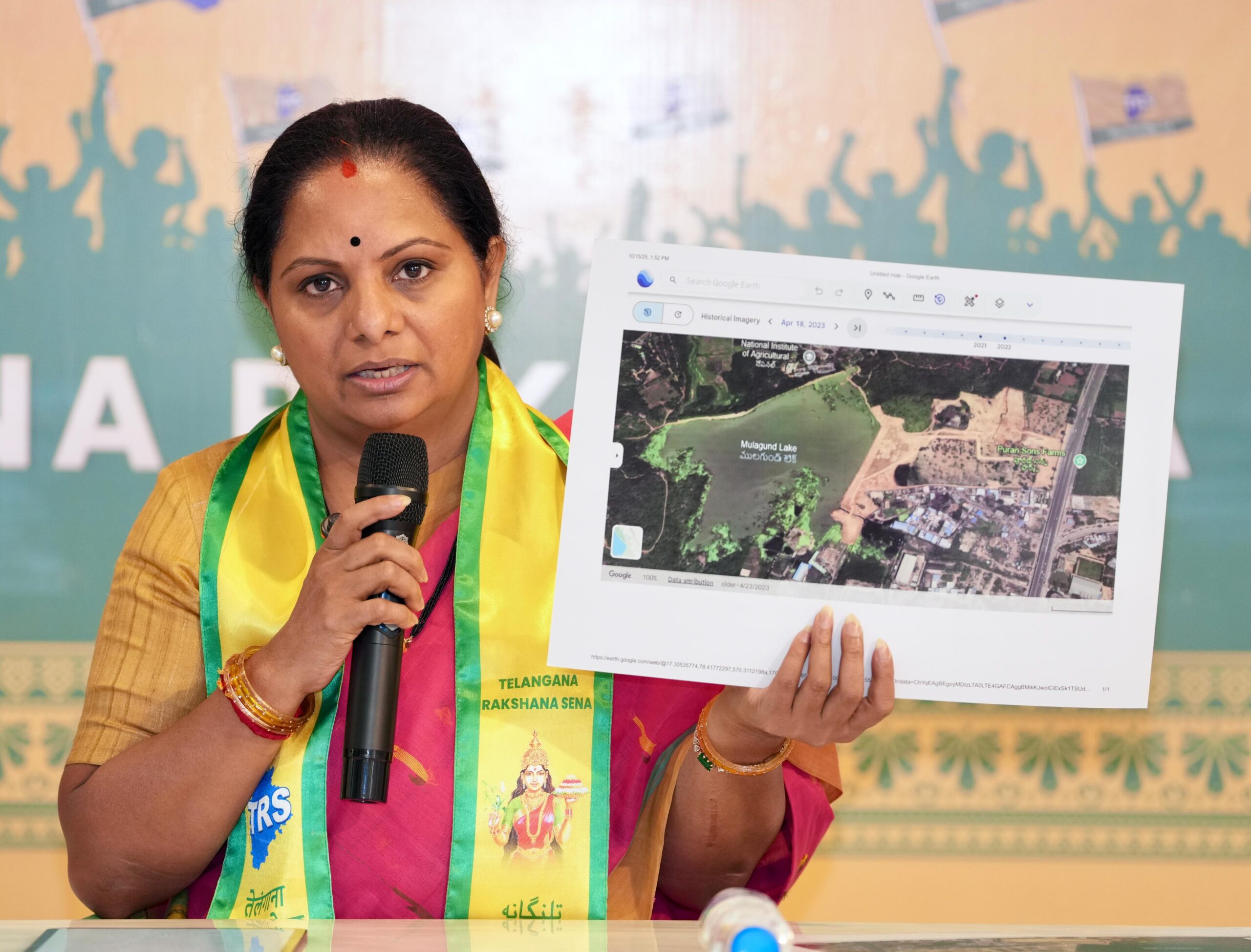 Kalvakuntla Kavitha addressing a press conference in Hyderabad alleging large-scale Telangana land irregularities and announcing a land protection movement