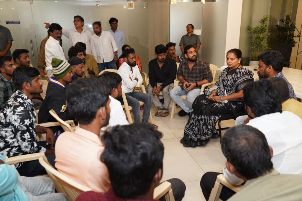Kalvakuntla Kavitha interacting with auto drivers during a meeting in Hyderabad.
