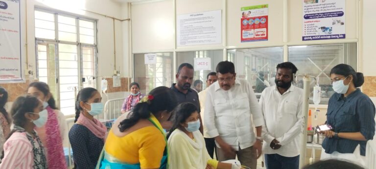 Telangana Rakshana Sena leaders Syed Ismail and Surarapu Krishnaveni visiting hospitalized nursing students at Suryapet Area Hospital